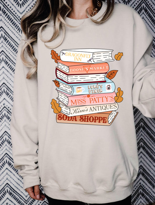 Cozy Stars Hollow Book Stack Crewneck Sweatshirt